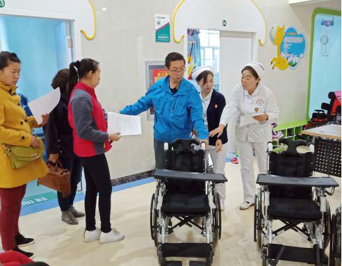 乌鲁木齐市残联捐赠轮椅发放仪式在新疆长安中医脑病医院如期举行